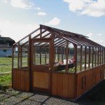 Traditional redwood and glass greenhouse photos