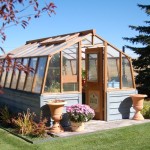 Barn-shaped wood greenhouse photos